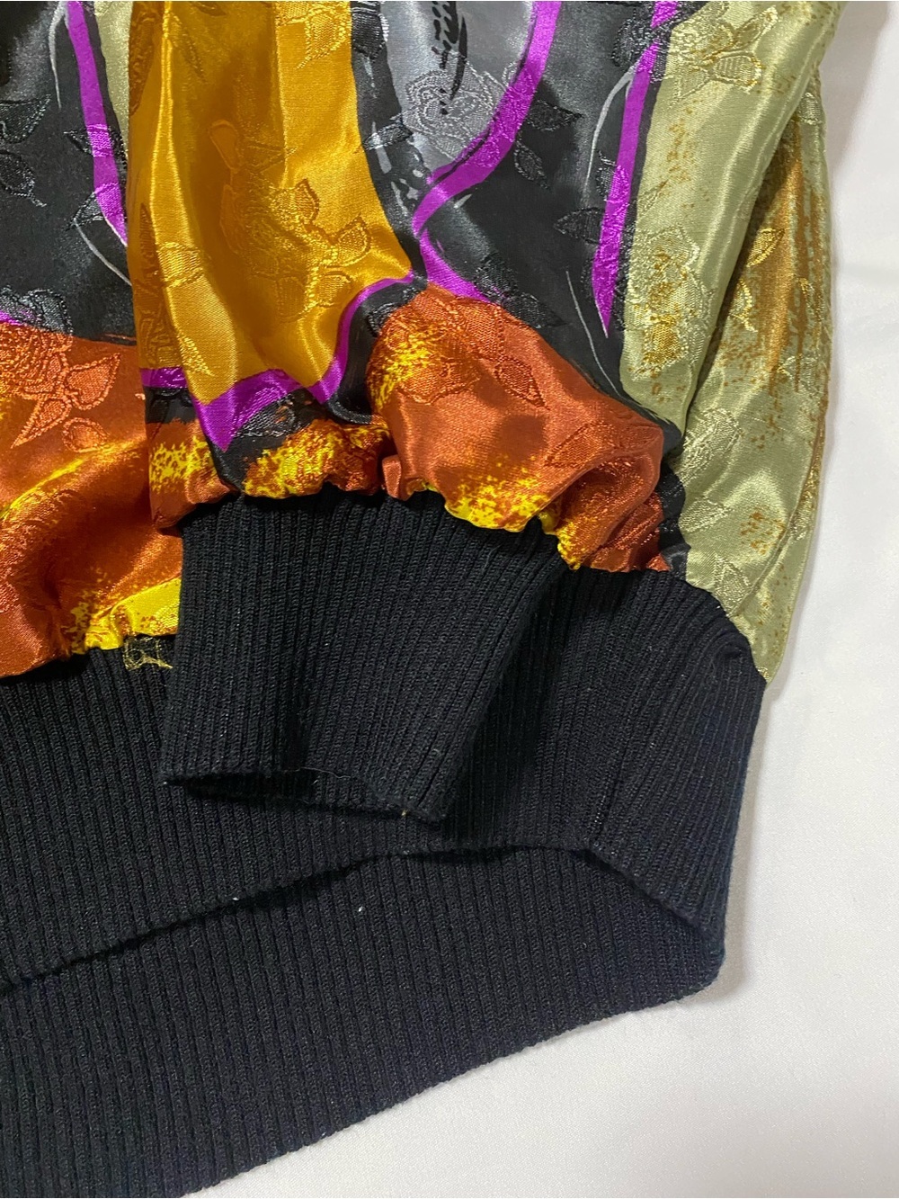 Artistic Abstract Face Print Bomber Jacket in Olive, Gold, Black - Picture 3 of 9